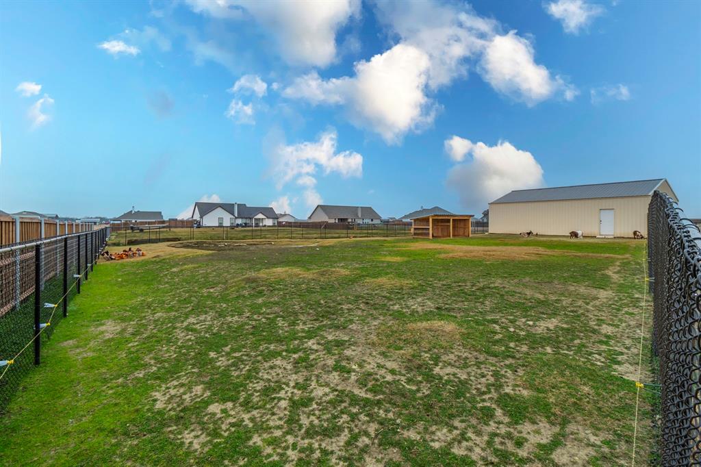 8432 Abner Road Terrell, TX 75161 - Photo 31 of 33 a view of a lake with houses in the background