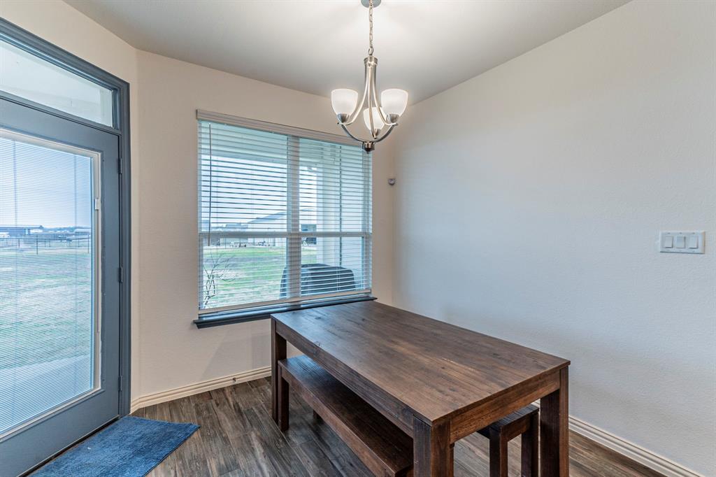 8432 Abner Road Terrell, TX 75161 - Photo 8 of 33 wooden floor in an empty room with a window