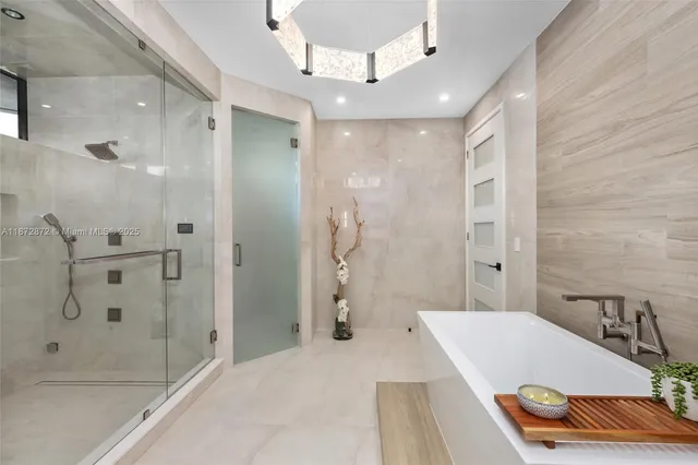 a spacious bathroom with a double vanity sink and a mirror