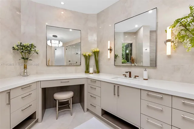 a bathroom with a double vanity sink and mirror