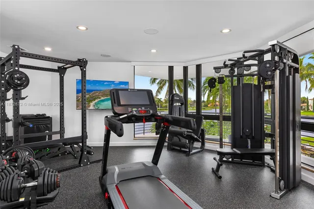 a bed room with a bed and a chandelier