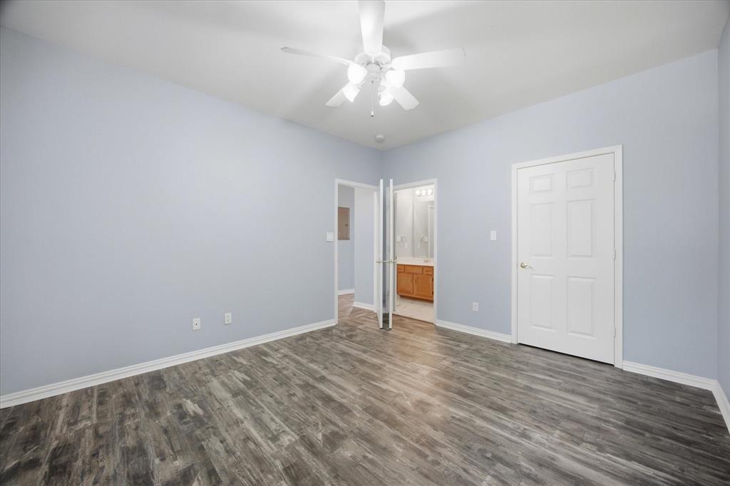 1846 Signal Ridge Place, Unit B4 Rockwall, TX 75032 - Photo 24 of 27 Spacious bedroom opens onto full bath