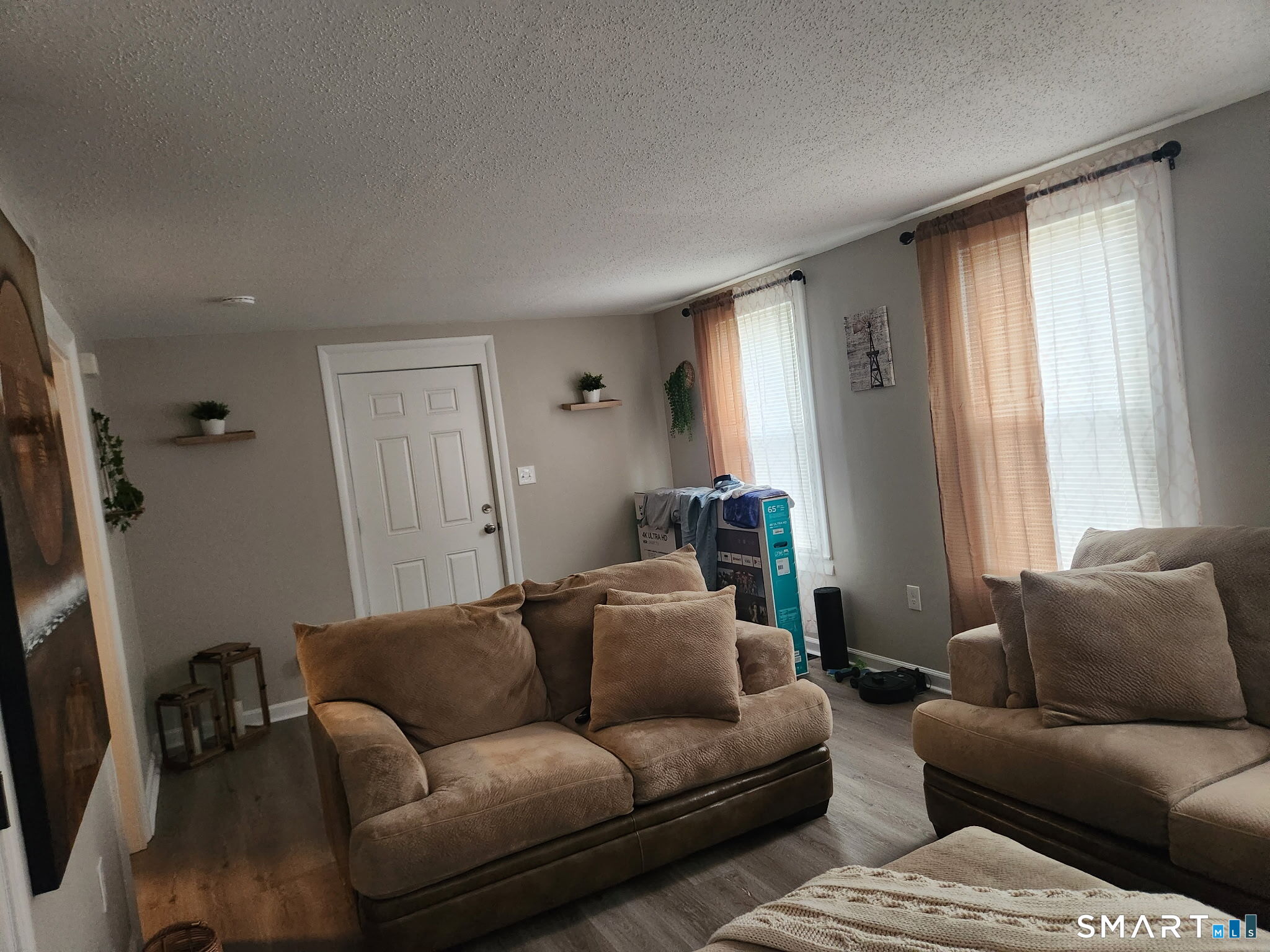 111-113 Sunset Avenue Meriden, CT 06450 - Photo 25 of 25 a living room with furniture and a window
