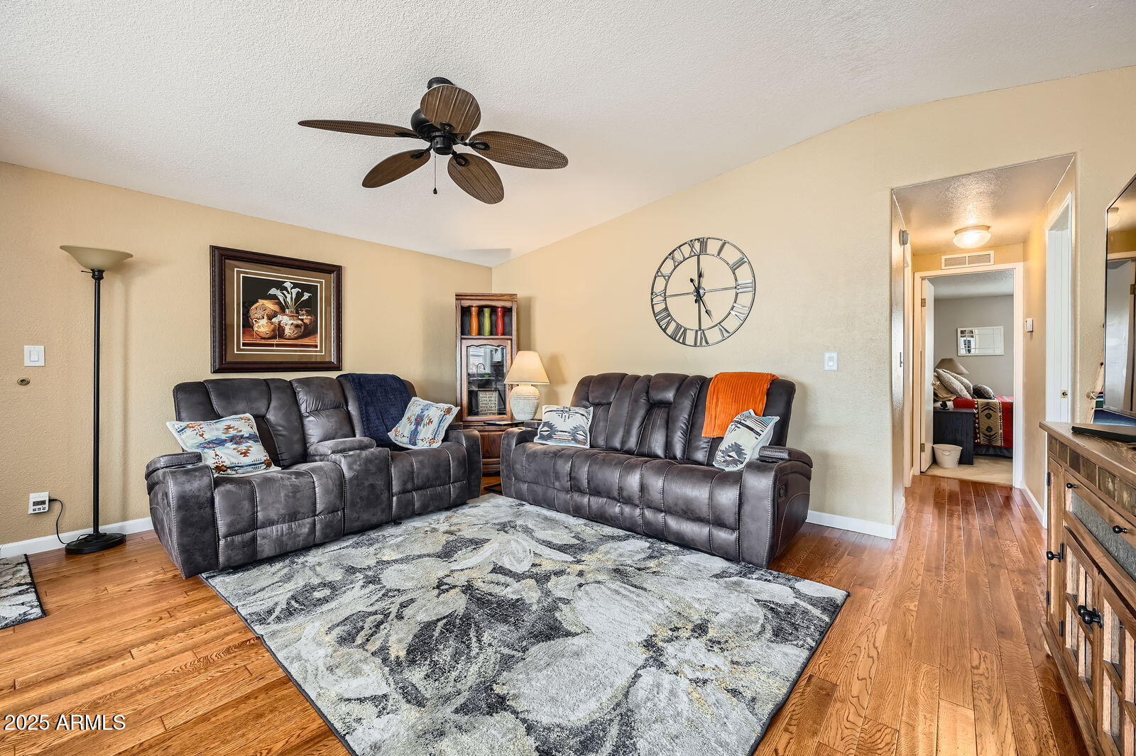 2400 East Baseline Avenue, Unit 94 Apache Junction, AZ 85119 - Photo 5 of 29 a living room with furniture and a wooden floor