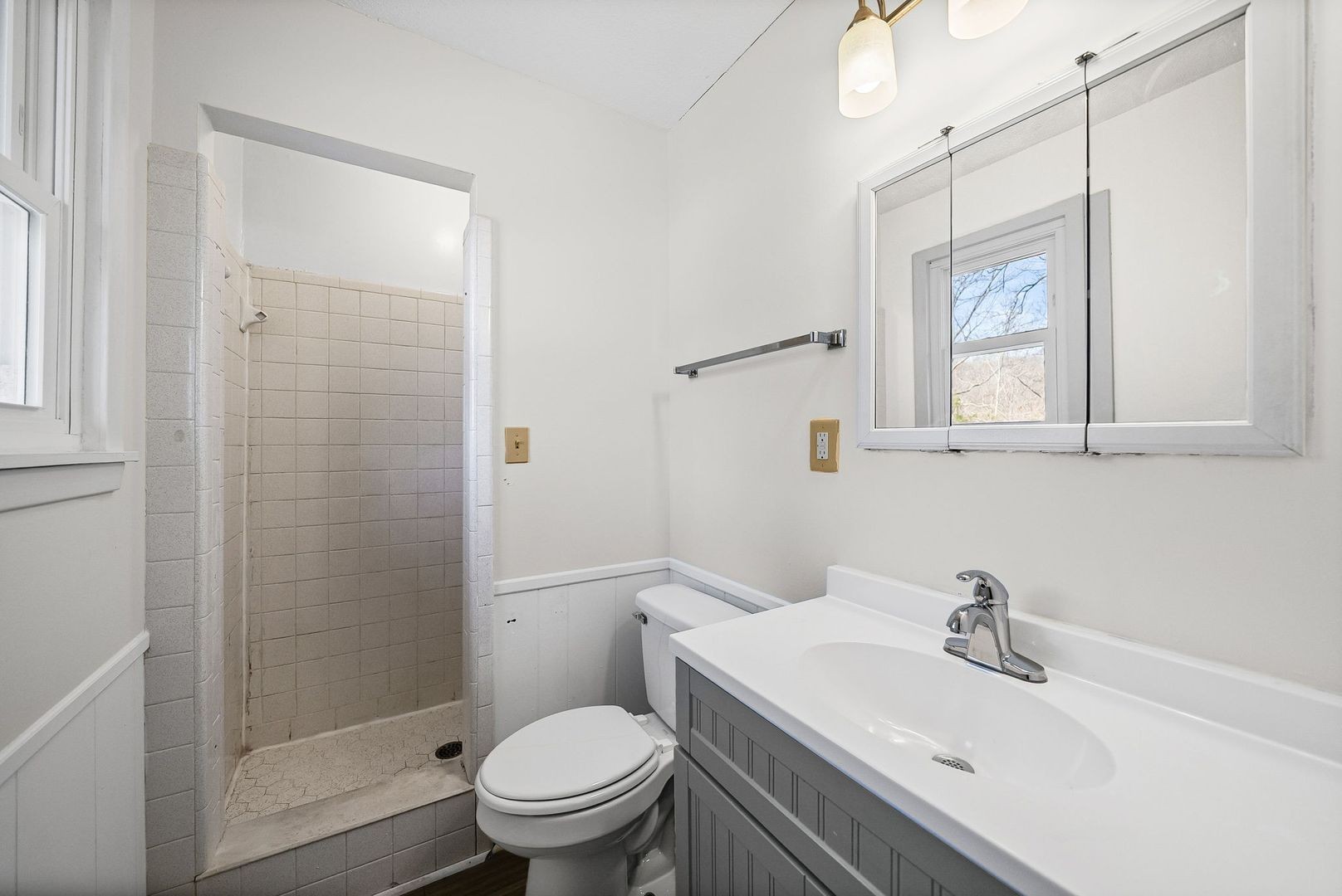 103 Millers Hill Road Dover, TN 37058 - Photo 15 of 30 a bathroom with a sink a toilet and shower