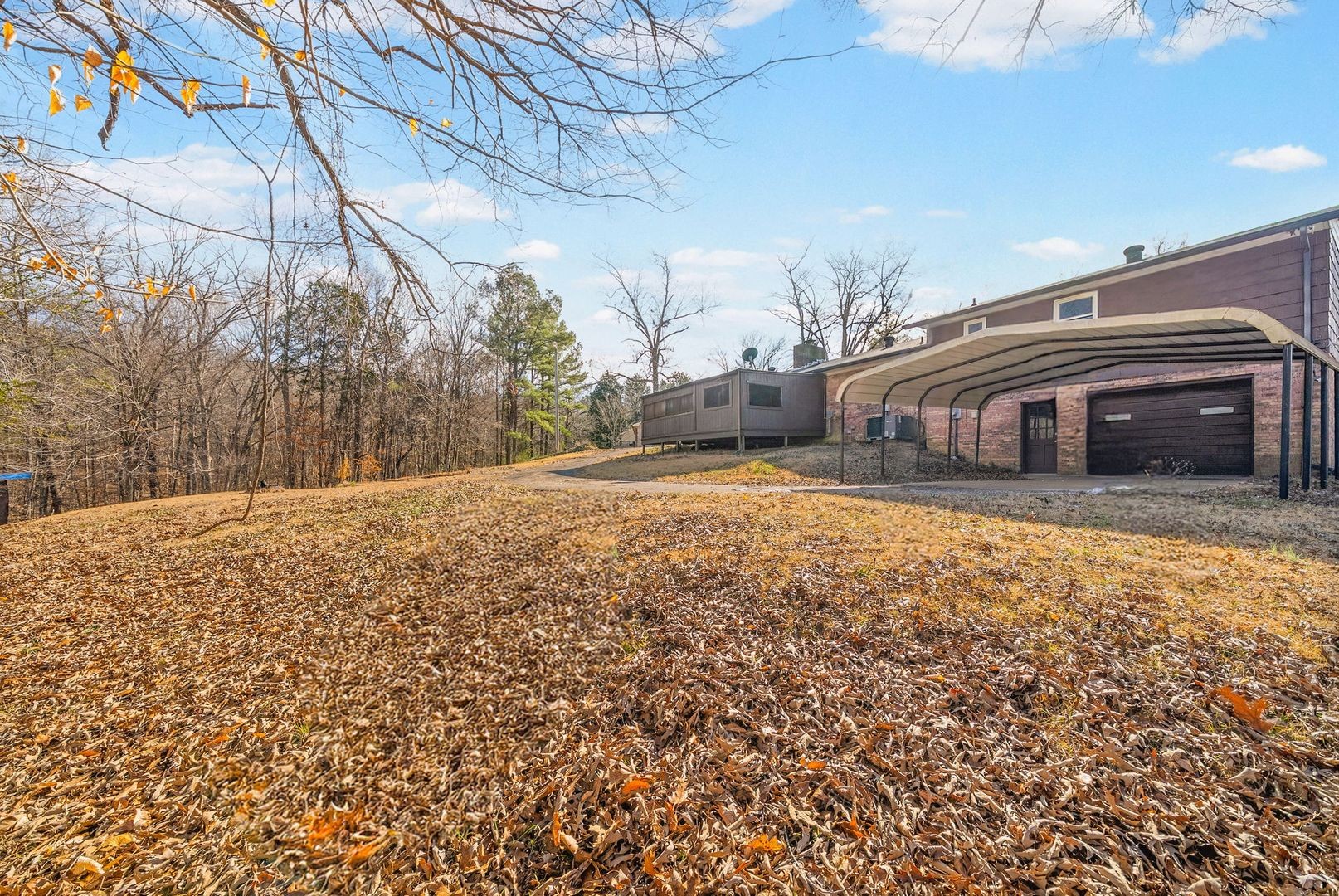 103 Millers Hill Road Dover, TN 37058 - Photo 28 of 30 a view of house with backyard and tree