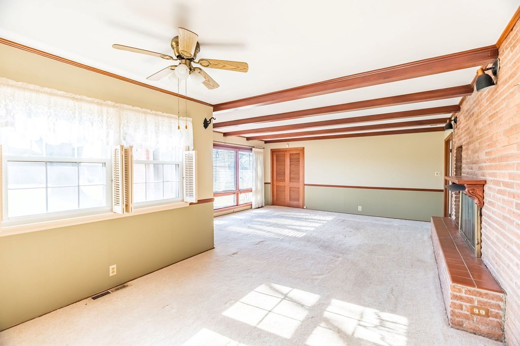 204 Ridgehill Drive Hopkinsville, KY 42240 - Photo 16 of 40 a view of a livingroom with a window and a ceiling fan