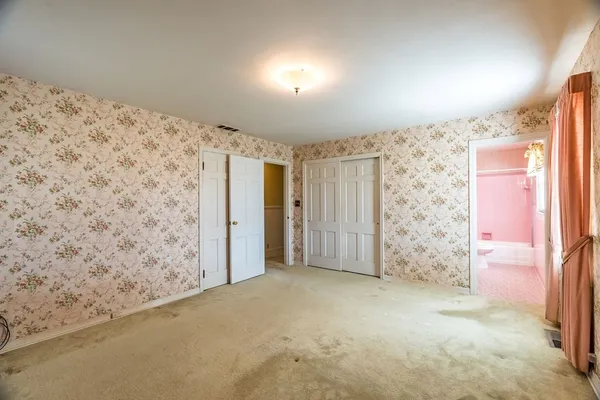 a bathroom with a sink toilet tub and shower
