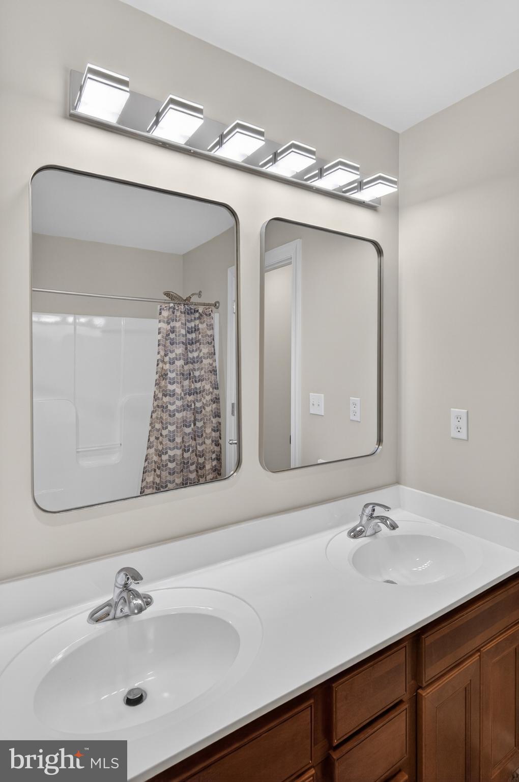 337 Roe Ingleside Road Centreville, MD 21617 - Photo 41 of 56 a bathroom with a sink and a mirror
