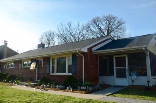 1874 Burma Road Salem, VA 24153 - Photo 1 of 19 a front view of a house with garden