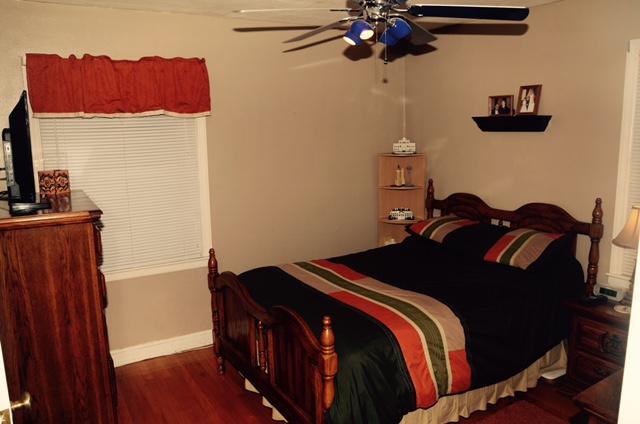 1874 Burma Road Salem, VA 24153 - Photo 16 of 19 a bedroom with a bed and wooden floor