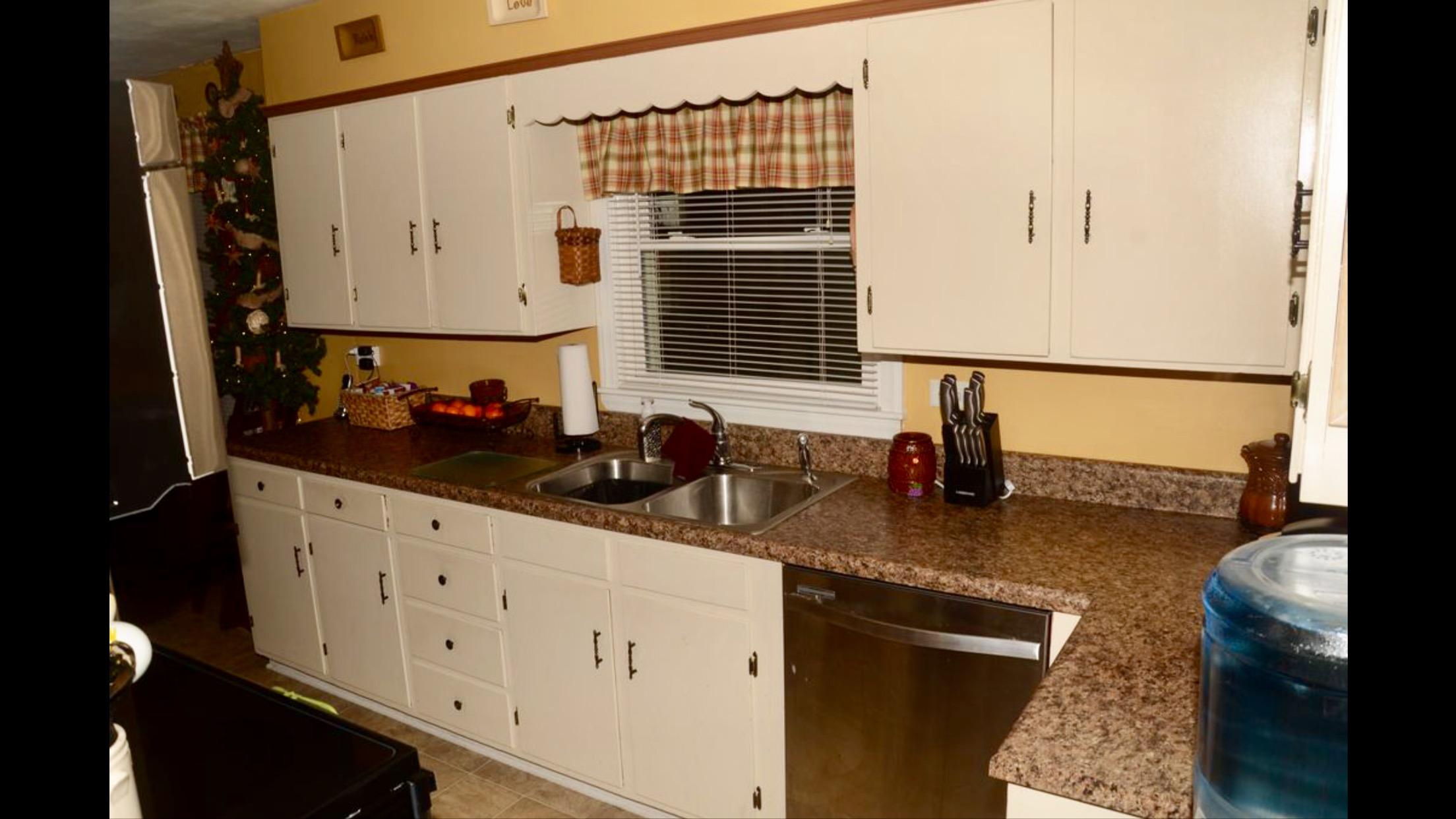 1874 Burma Road Salem, VA 24153 - Photo 9 of 19 a kitchen with sink refrigerator and window