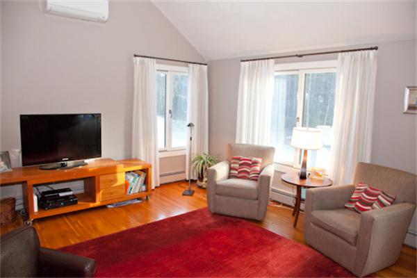62 South Shaker Road Harvard, MA 01451 - Photo 5 of 30 a living room with furniture and a flat screen tv