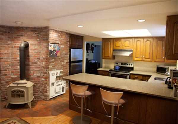 62 South Shaker Road Harvard, MA 01451 - Photo 8 of 30 a kitchen with stainless steel appliances a sink and a refrigerator
