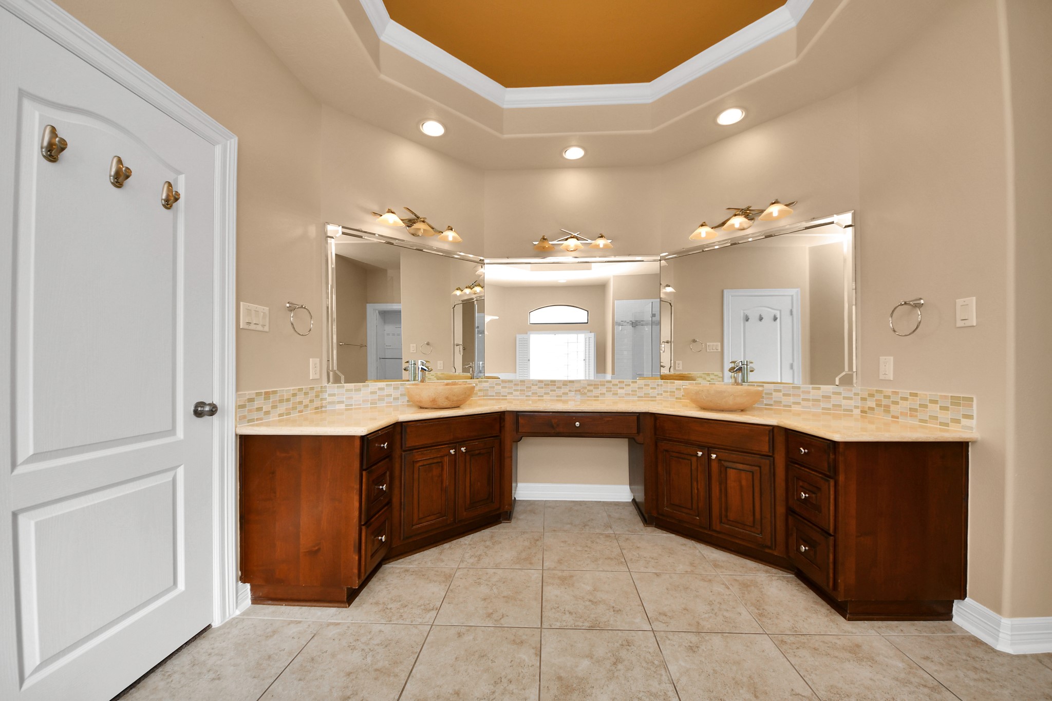 3511 River Bend Drive Rosenberg, TX 77471 - Photo 23 of 50 Bright and spacious owner’s bathroom with two custom sinks and mirrors.
