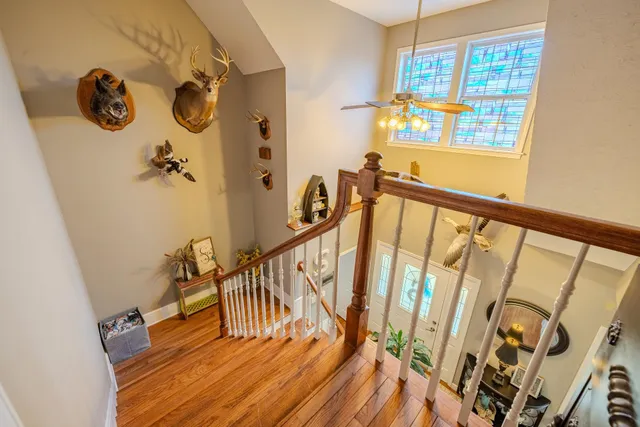 a view of an entryway with wooden floor
