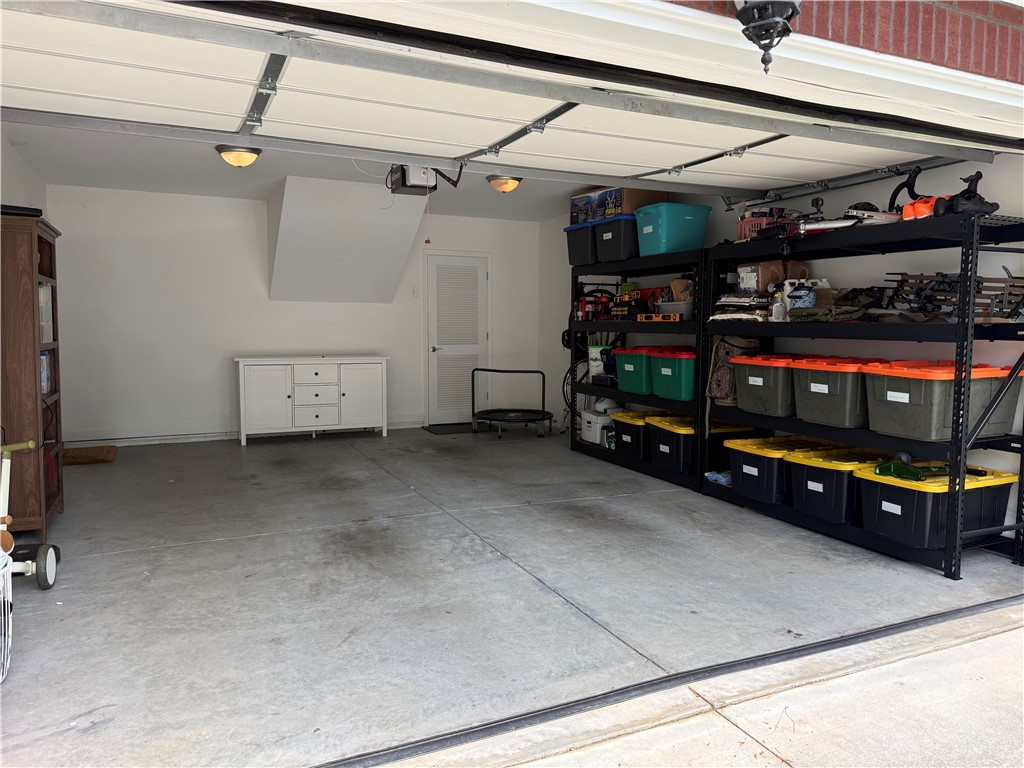 123 Abigail Lane Anderson, SC 29621 - Photo 18 of 22 This spacious garage offers ample storage solutions and direct access to the interior.