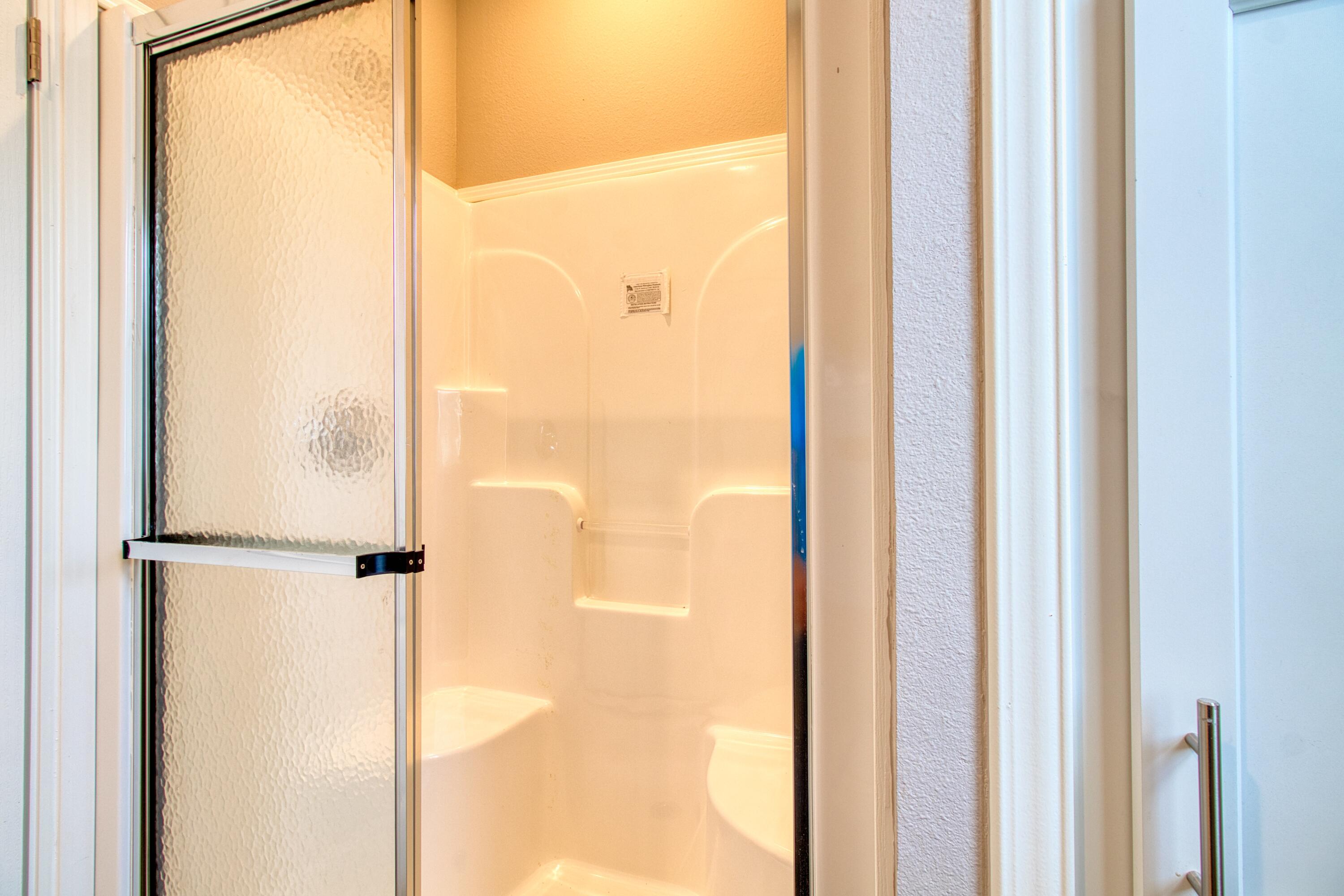 10701 South Ocean Drive, Unit 613 Jensen Beach, FL 34957 - Photo 20 of 64 a bathroom with a shower