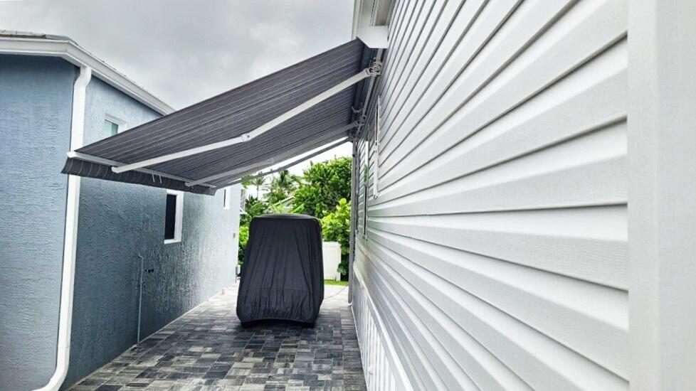 10701 South Ocean Drive, Unit 613 Jensen Beach, FL 34957 - Photo 23 of 64 Jensen Beach, FL Home - Awning