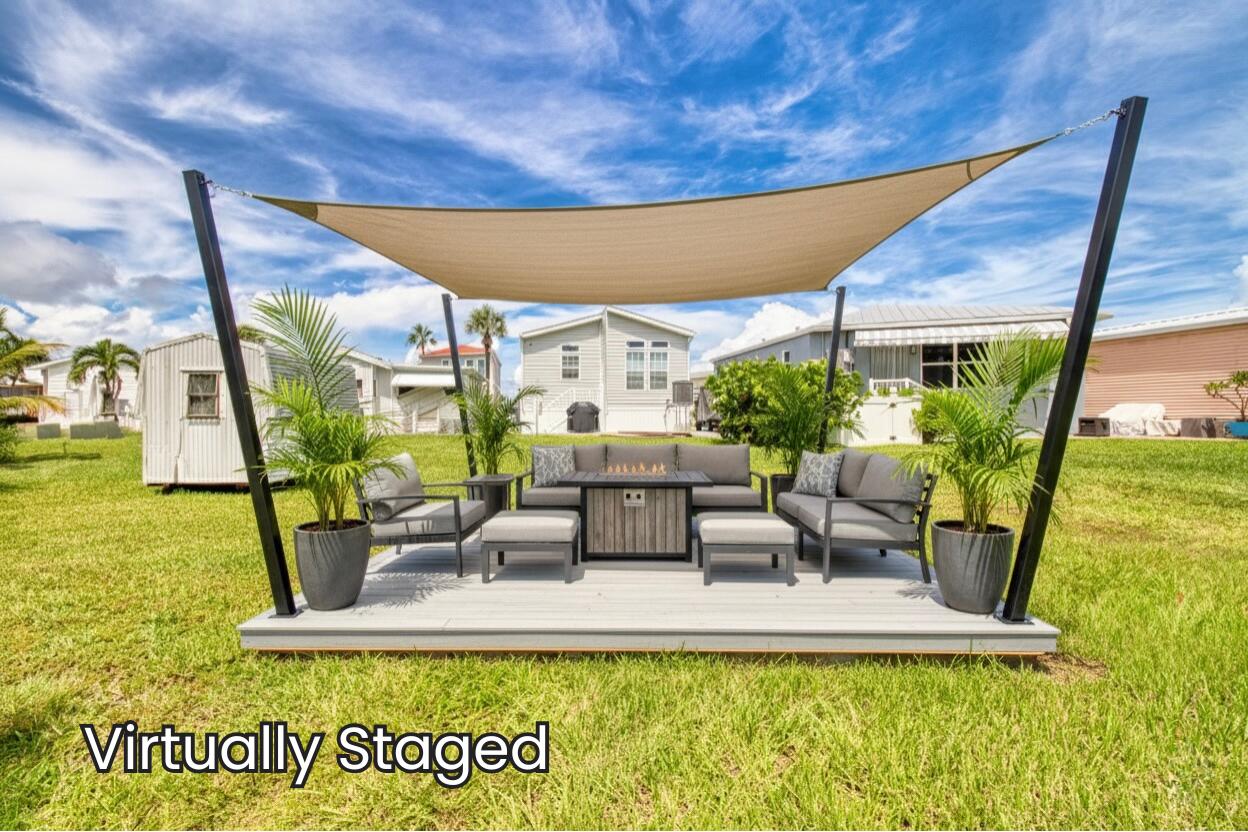 10701 South Ocean Drive, Unit 613 Jensen Beach, FL 34957 - Photo 28 of 64 a view of a swimming pool with furniture