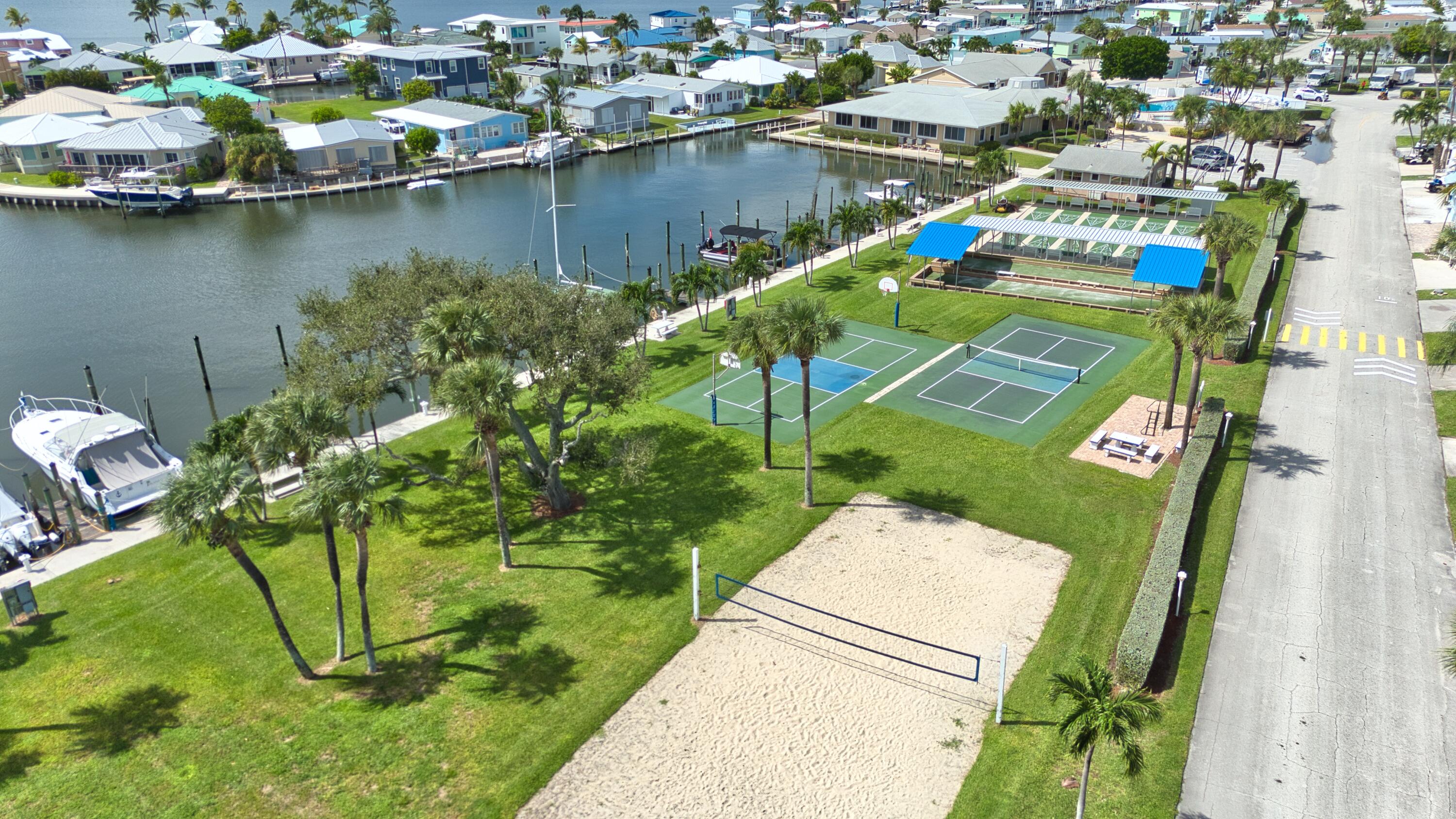 10701 South Ocean Drive, Unit 613 Jensen Beach, FL 34957 - Photo 44 of 64 an aerial view of a house with a lake view