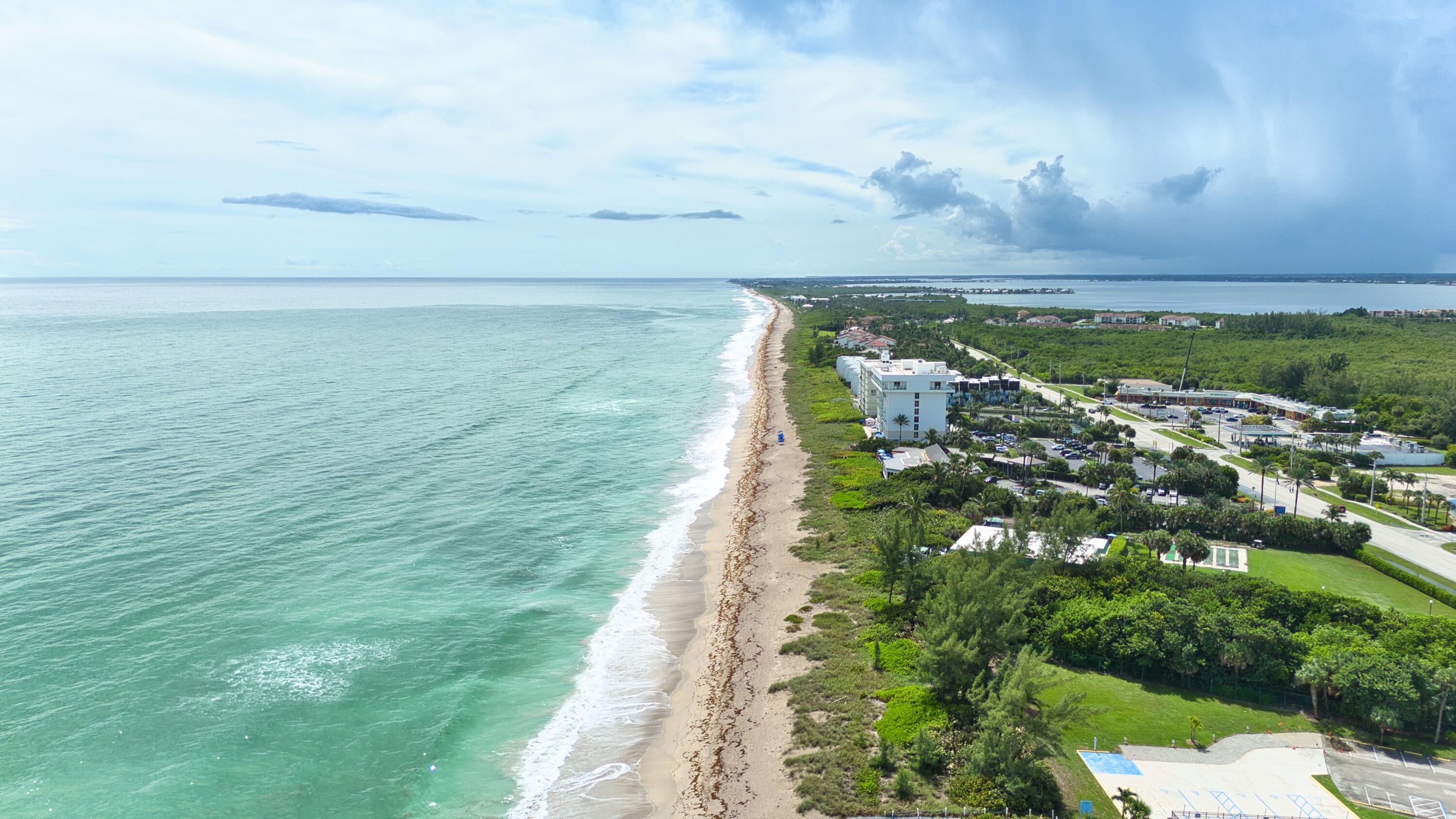 10701 South Ocean Drive, Unit 613 Jensen Beach, FL 34957 - Photo 57 of 64 a view of a city with an ocean view