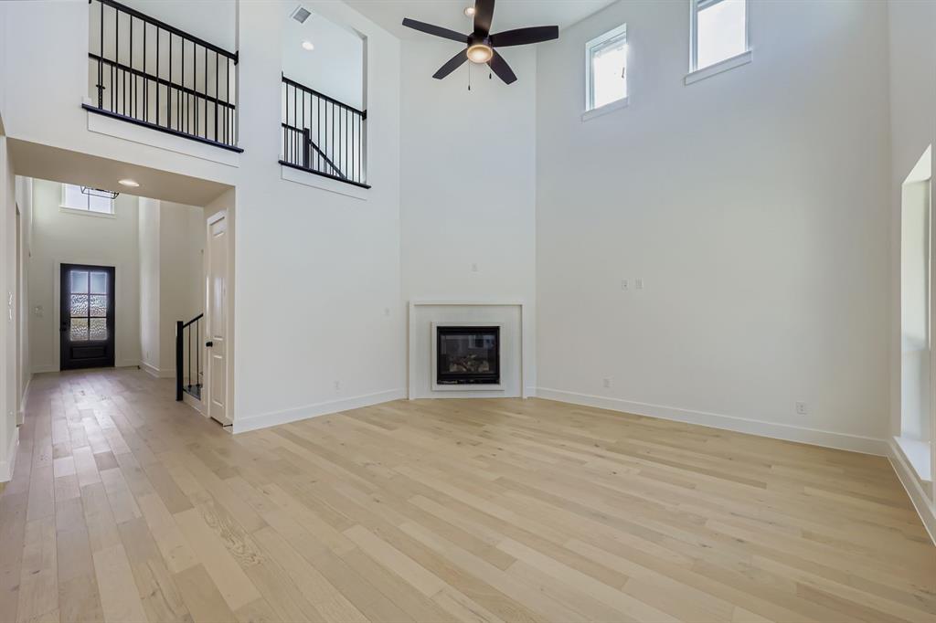 1841 Pk Vista Way Midlothian, TX 76065 - Photo 2 of 28 a view of an empty room with a fireplace