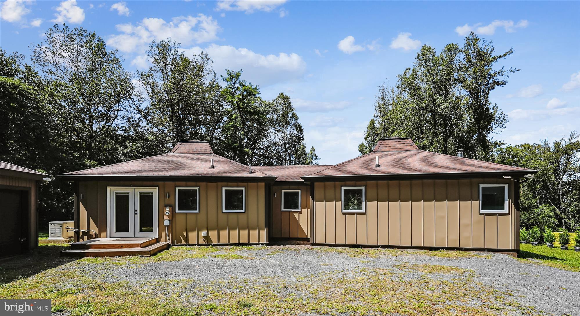 21826 Blue Ridge Mountain Road Paris, VA 20130 - Photo 3 of 60 a front view of a house with a yard