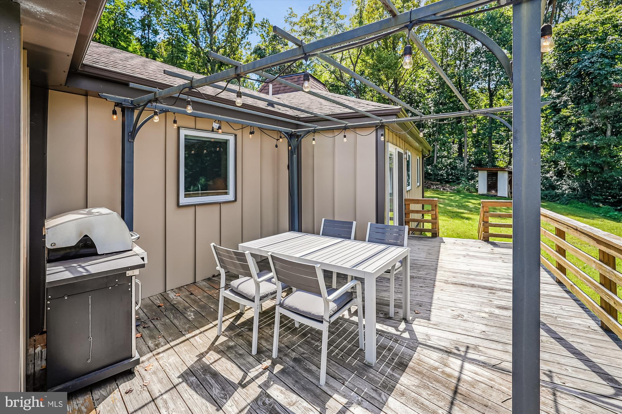 21826 Blue Ridge Mountain Road Paris, VA 20130 - Photo 34 of 60 a view of a patio with a table chairs and a table