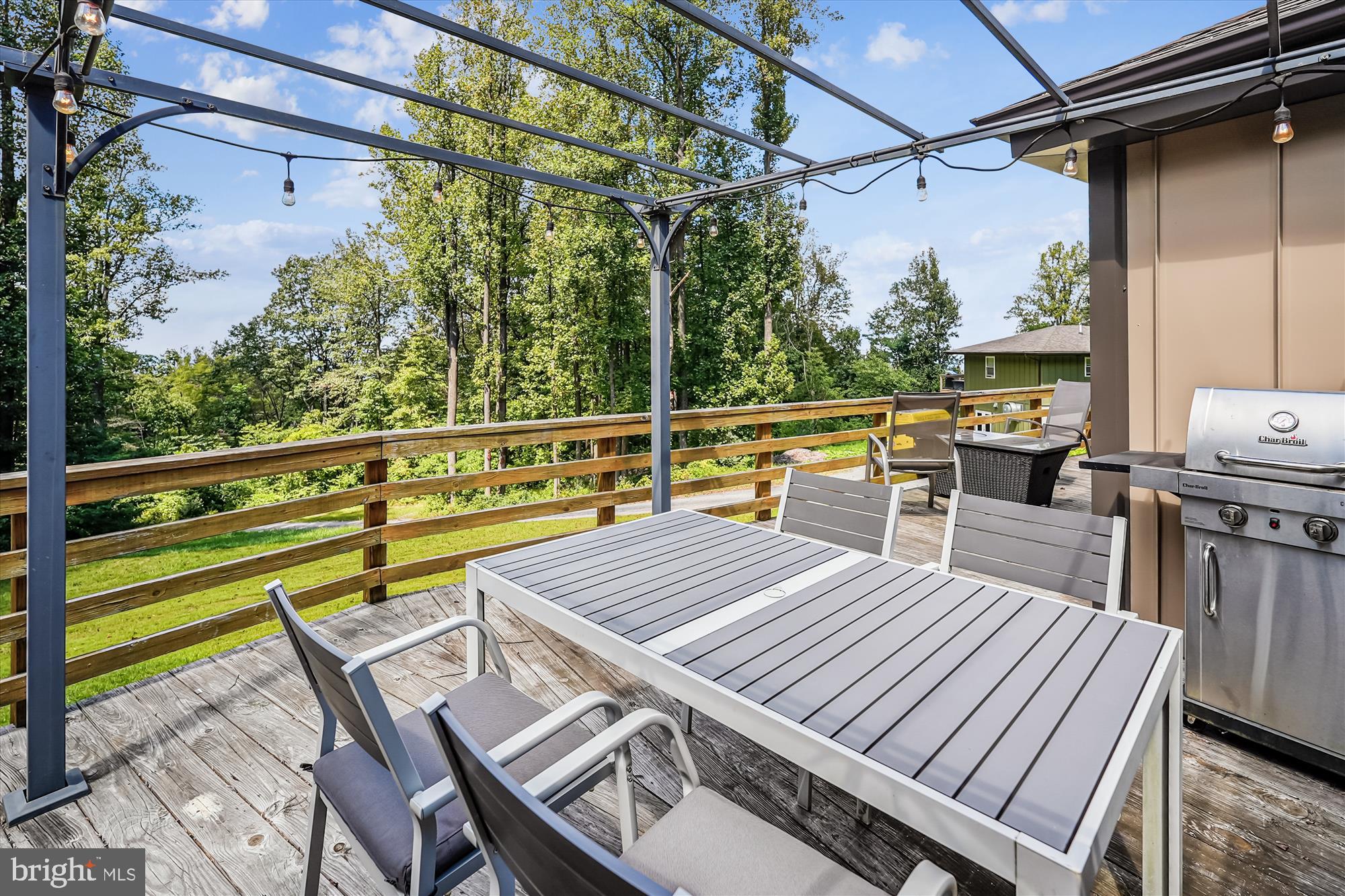 21826 Blue Ridge Mountain Road Paris, VA 20130 - Photo 35 of 60 a view of a patio with table and chairs