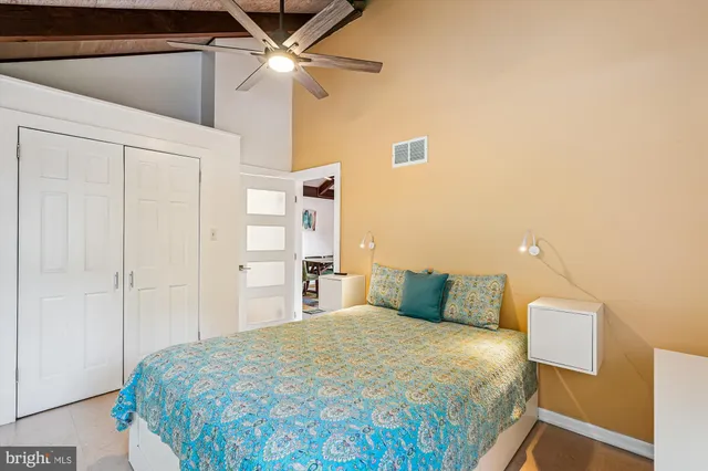 a bathroom with a tub and shower