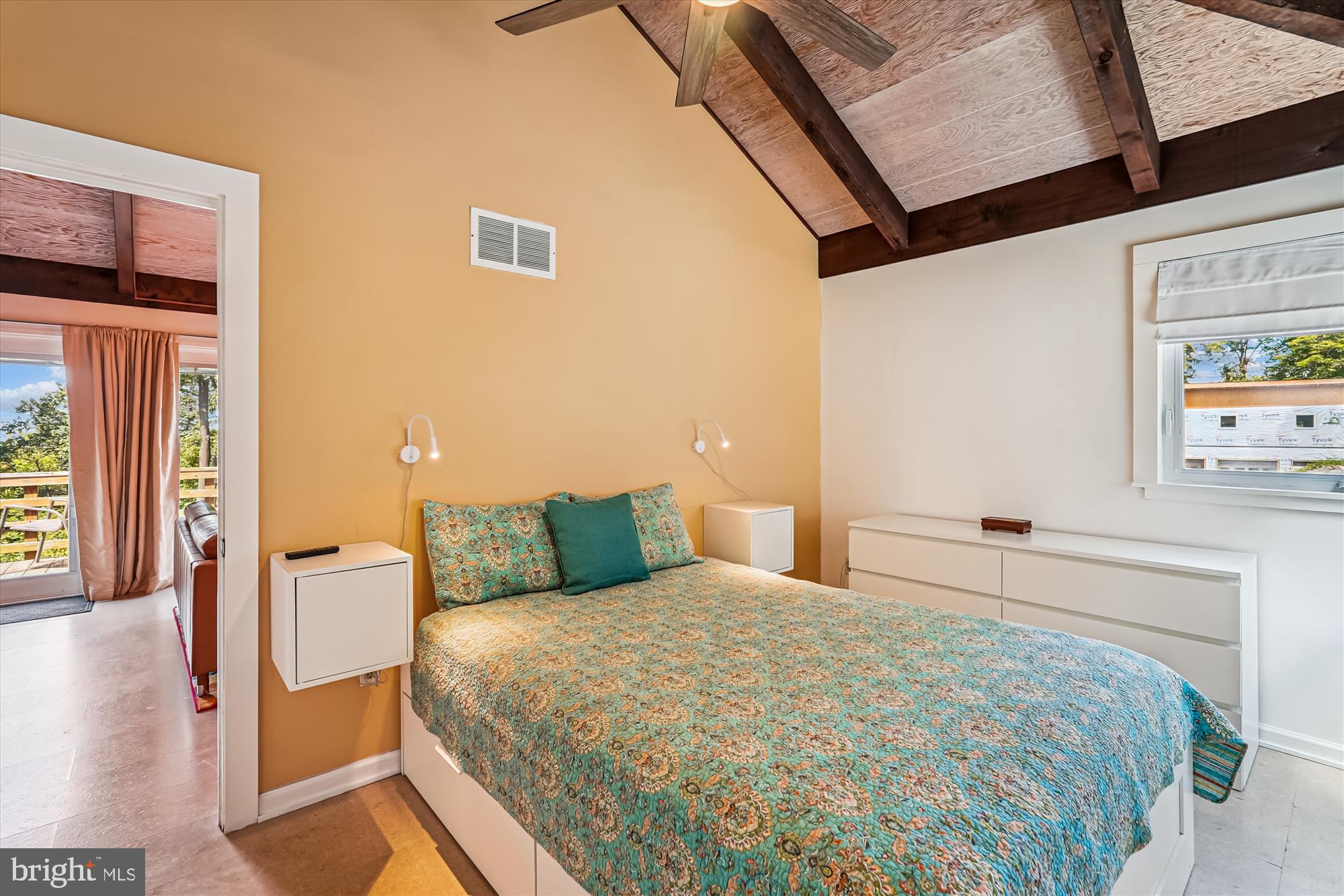 21826 Blue Ridge Mountain Road Paris, VA 20130 - Photo 37 of 60 a bedroom with a bed and wooden floor