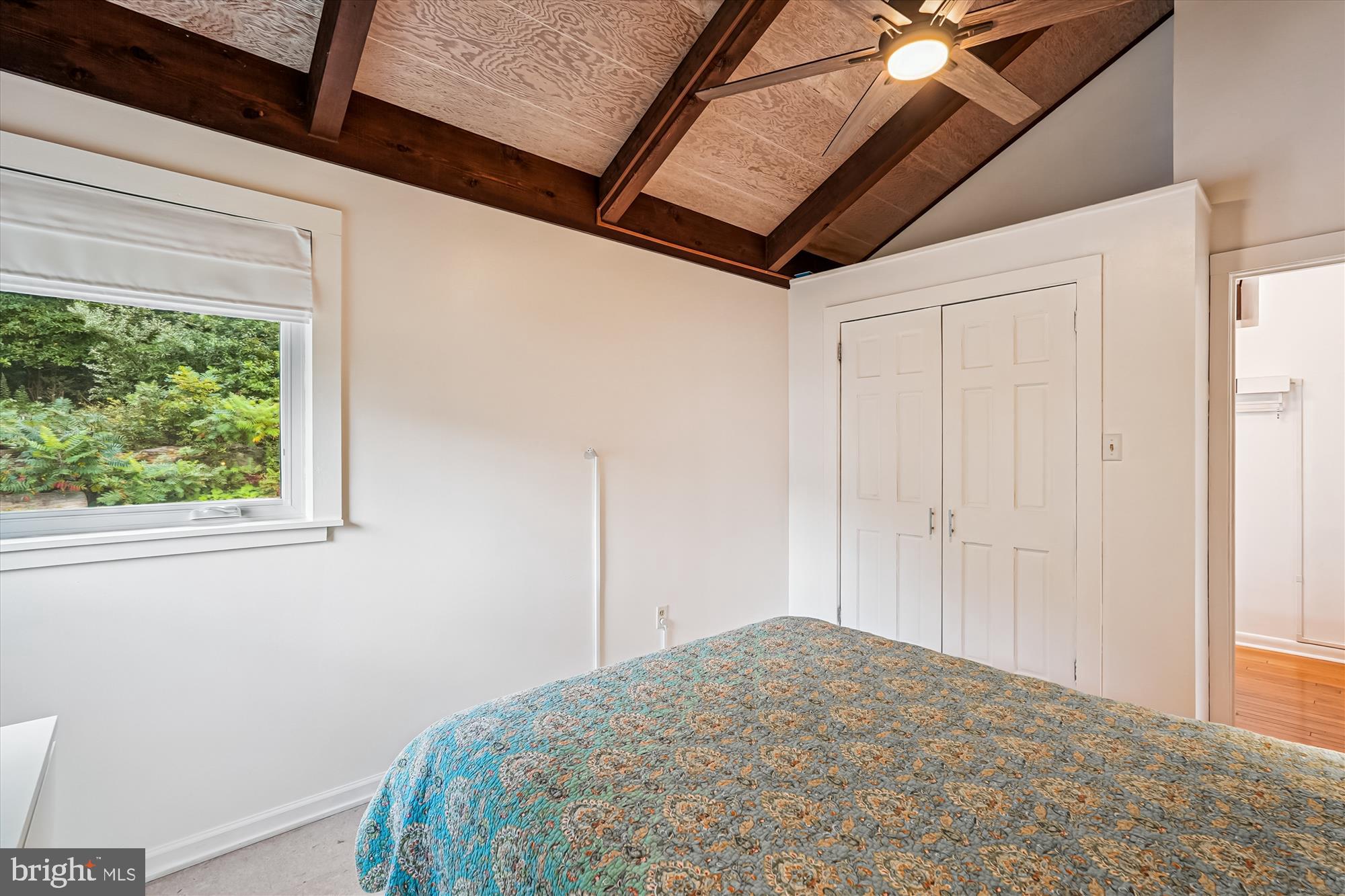 21826 Blue Ridge Mountain Road Paris, VA 20130 - Photo 39 of 60 a bedroom with a bed and a window