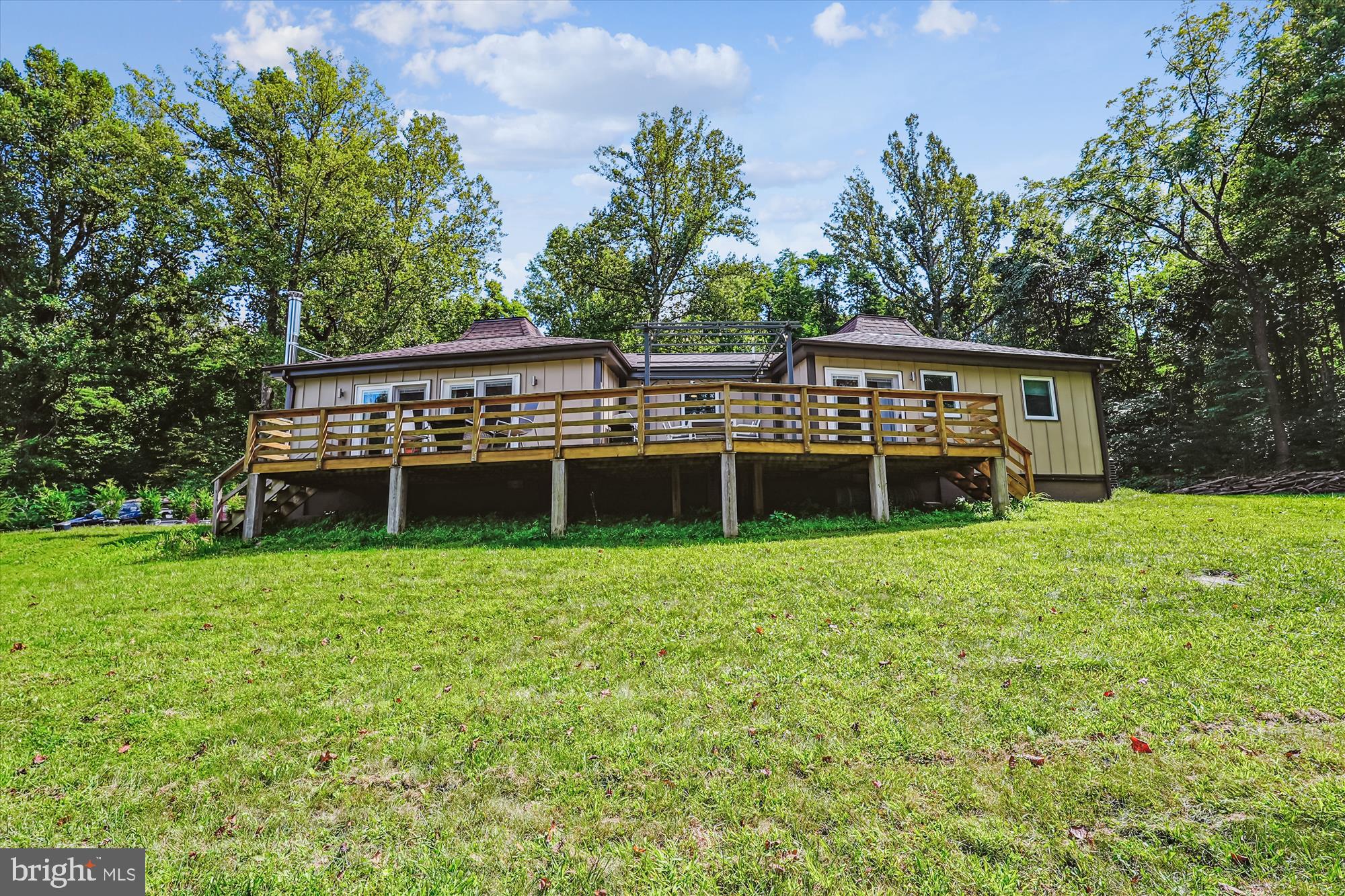 21826 Blue Ridge Mountain Road Paris, VA 20130 - Photo 5 of 60 a view of a house with backyard and a garden