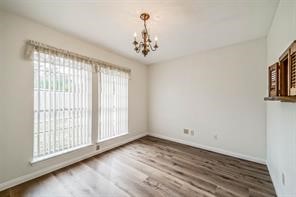 1111 Pecan Circle Seabrook, TX 77586 - Photo 13 of 31 a view of an empty room with a window