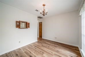 1111 Pecan Circle Seabrook, TX 77586 - Photo 14 of 31 a view of a livingroom with a chandelier fan