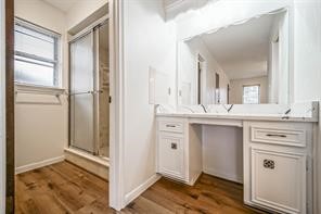1111 Pecan Circle Seabrook, TX 77586 - Photo 18 of 31 a bathroom with a sink and a mirror