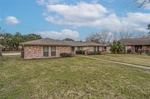 1111 Pecan Circle Seabrook, TX 77586 - Photo 28 of 31 a view of a house with a yard