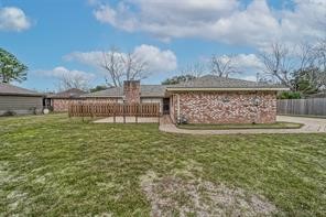 1111 Pecan Circle Seabrook, TX 77586 - Photo 30 of 31 a view of a garden with a fountain
