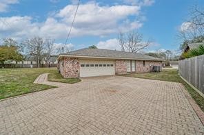 1111 Pecan Circle Seabrook, TX 77586 - Photo 3 of 31 a view of a water fountain in front of a house