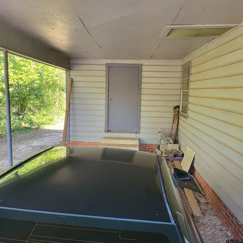 a view of a balcony with chair