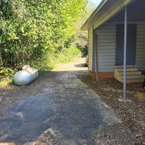 a view of a backyard of a house