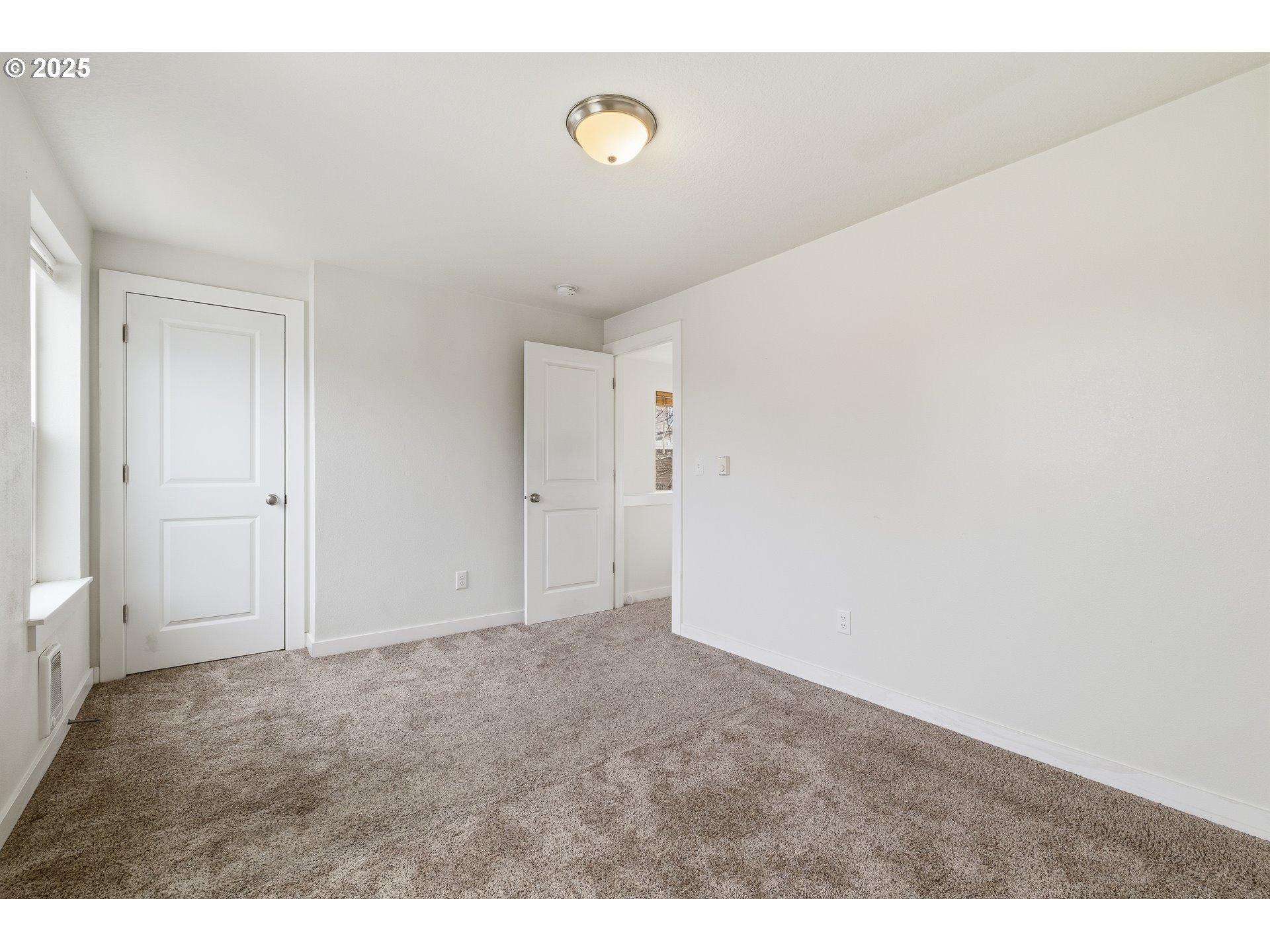 3223 Southeast 122nd Avenue Portland, OR 97236 - Photo 11 of 21 a view of an empty room