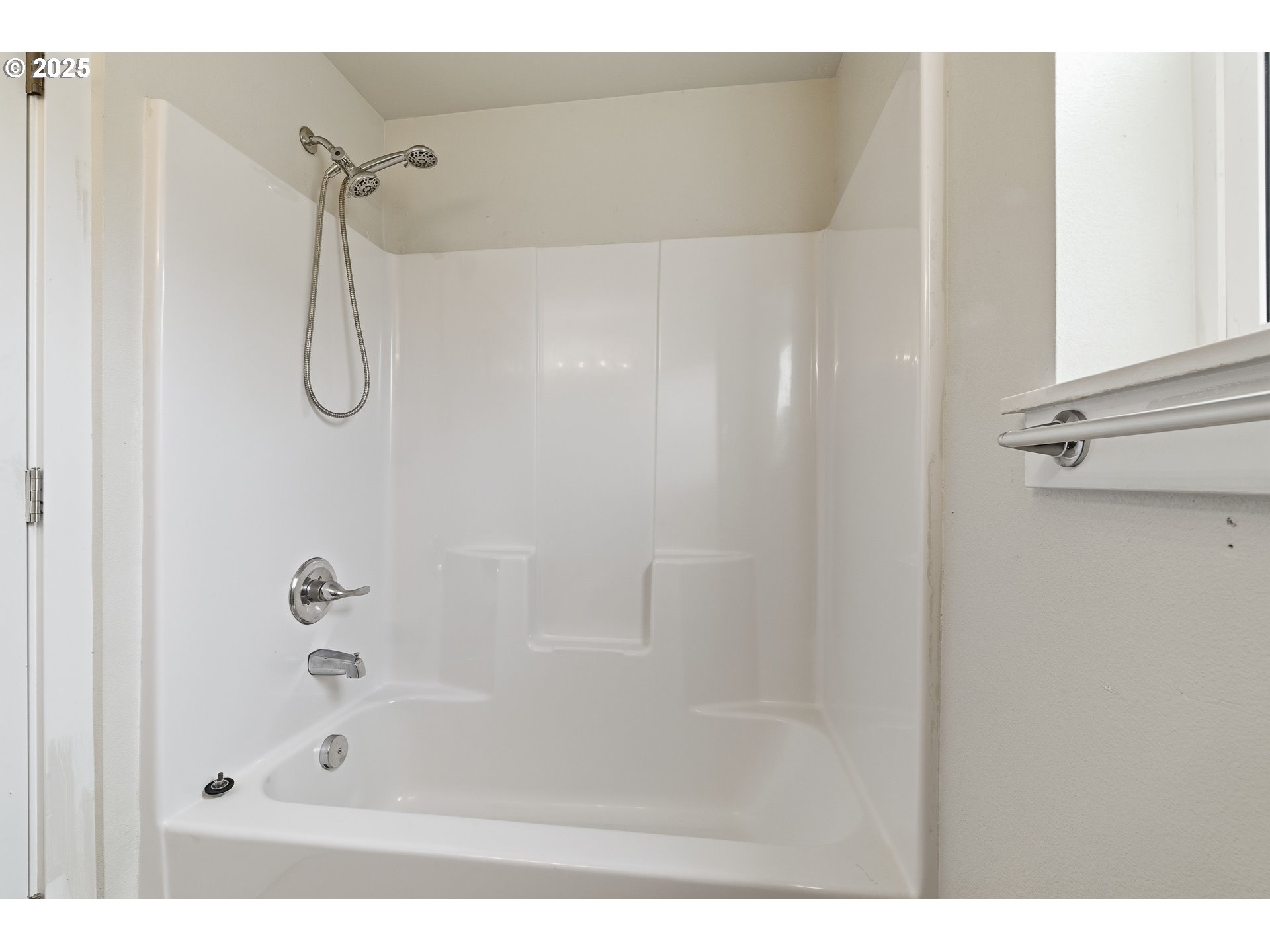 3223 Southeast 122nd Avenue Portland, OR 97236 - Photo 13 of 21 a bathroom with a bath tub with a shower