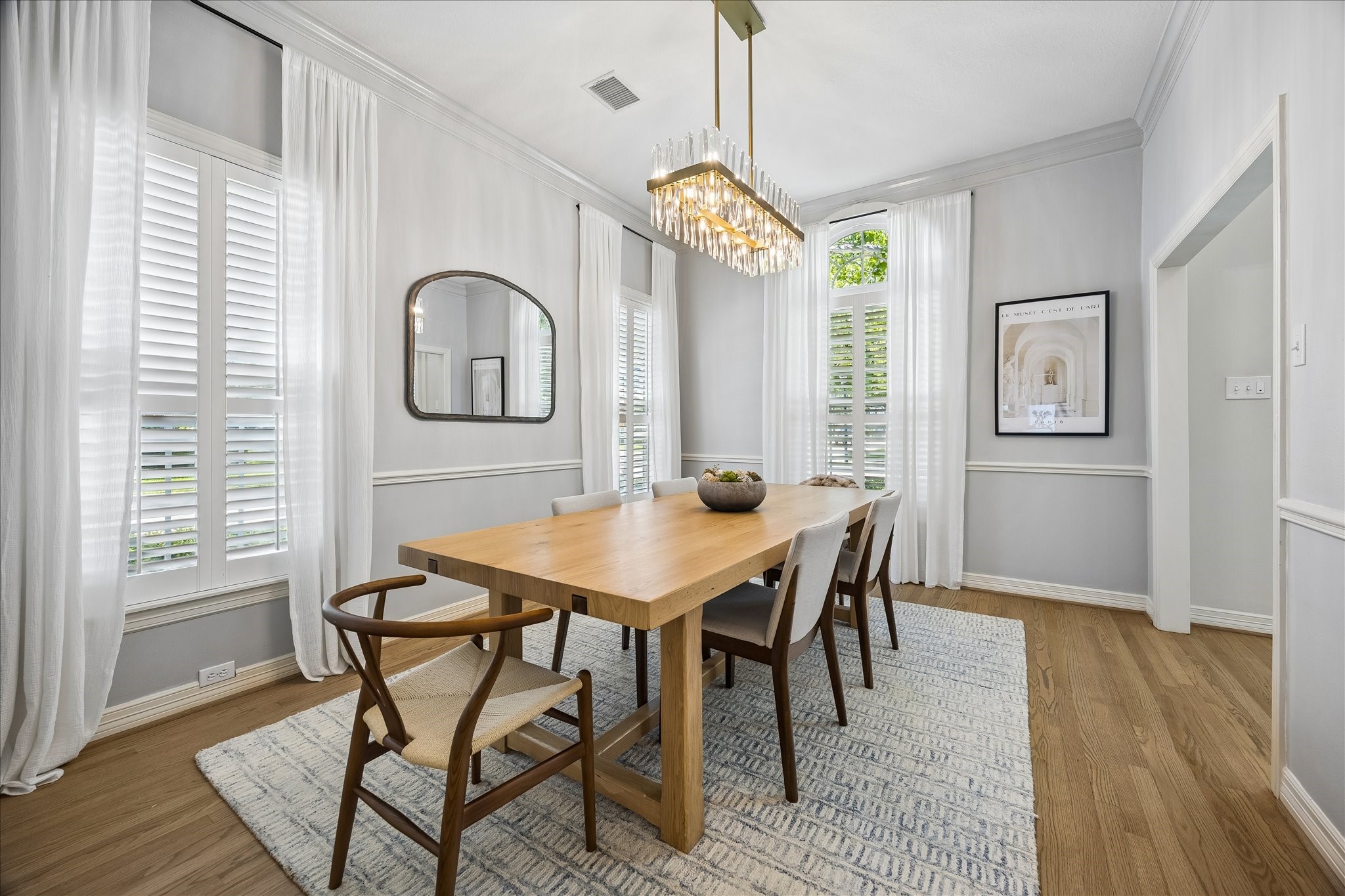 4131 Sunset Boulevard Houston, TX 77005 - Photo 9 of 38 a view of a dining room with furniture window and wooden floor