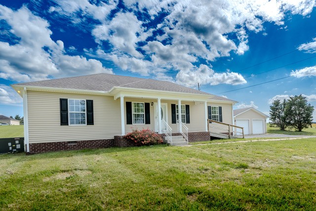a front view of house with yard