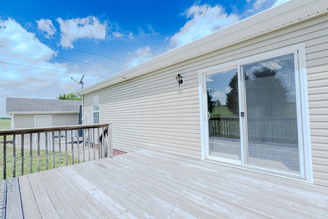 4272 J L Head Road Cedar Hill, TN 37032 - Photo 16 of 30 a view of a deck with wooden floor and fence