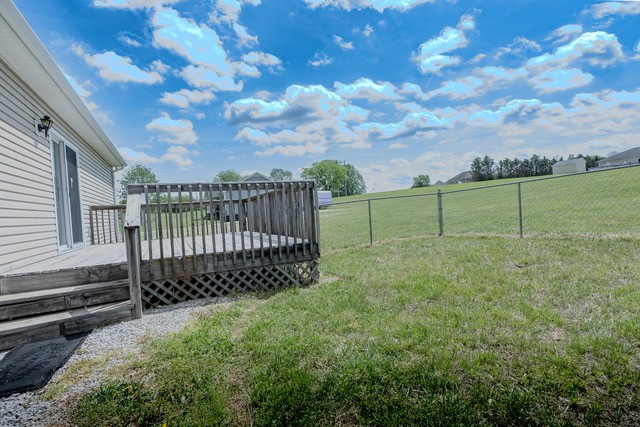 4272 J L Head Road Cedar Hill, TN 37032 - Photo 18 of 30 a view of a yard with a wooden fence