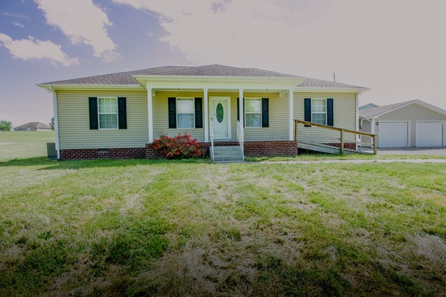 4272 J L Head Road Cedar Hill, TN 37032 - Photo 2 of 30 a view of a house with a yard and sitting area