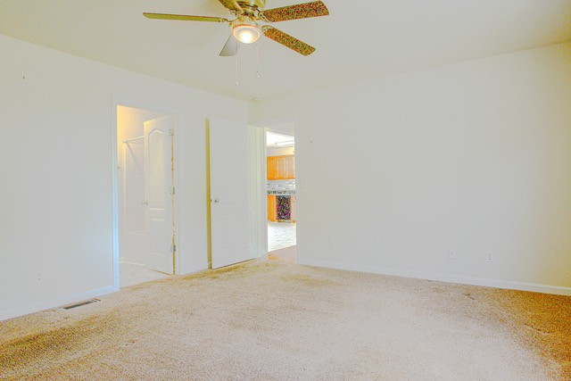 4272 J L Head Road Cedar Hill, TN 37032 - Photo 24 of 30 an empty room with windows and fan